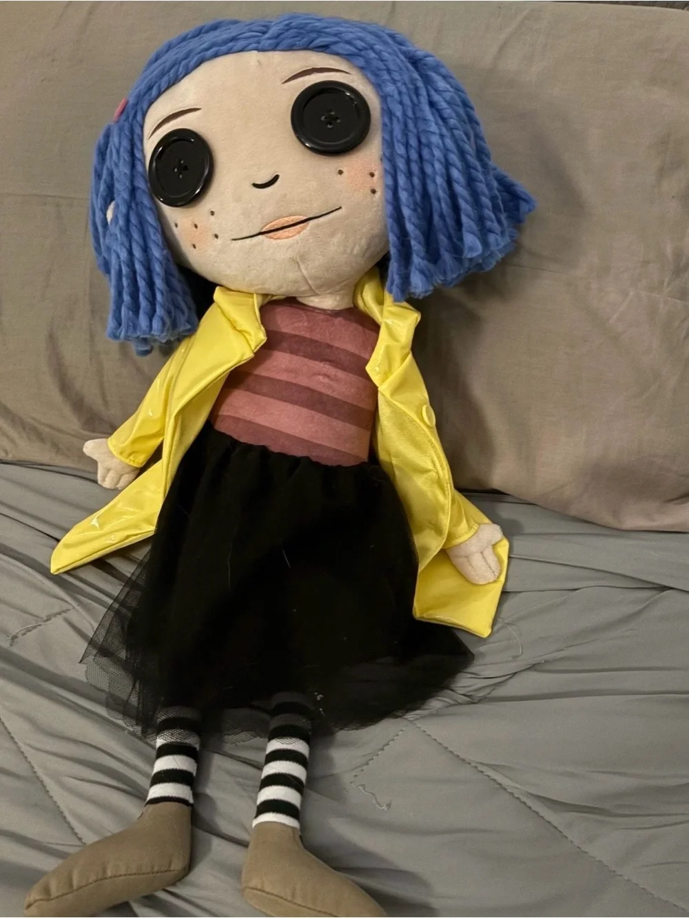 Blue-Haired Coral-Inspired Plush Doll with Yellow Coat